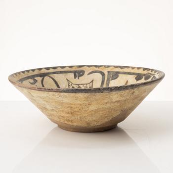 A glazed earthenware bowl, Central Asia.