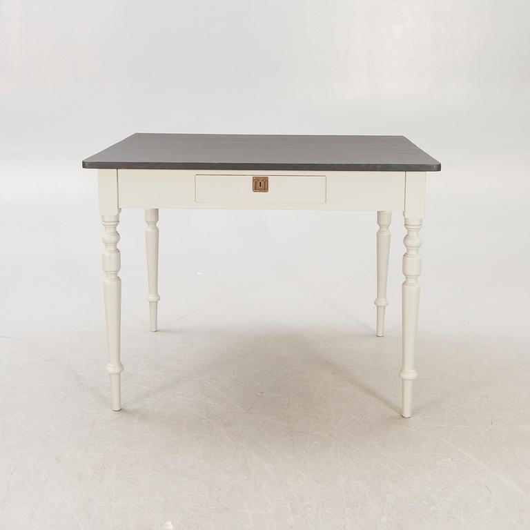 A painted working table later part of the 19th century.