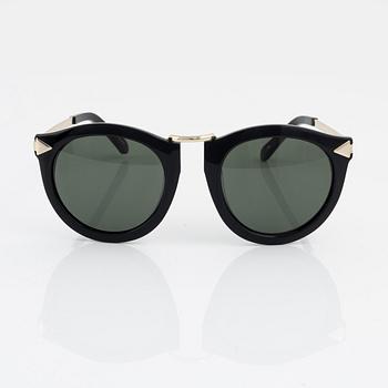 Karen Walker, a pair of "Harvest" sunglasses.