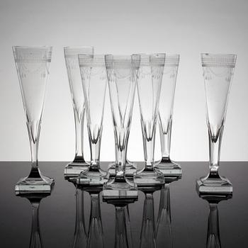 A set of 8 early 19th century champagne glasses.
