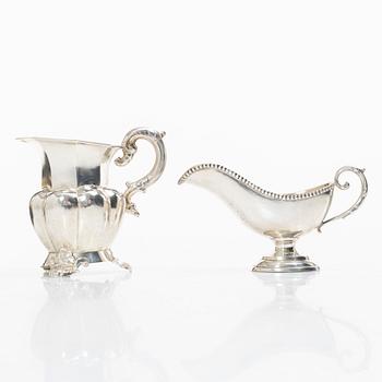 A silver gravy boat, Germany, and a silver creamer, johan Petter Tullgren, Sweden, 1857.