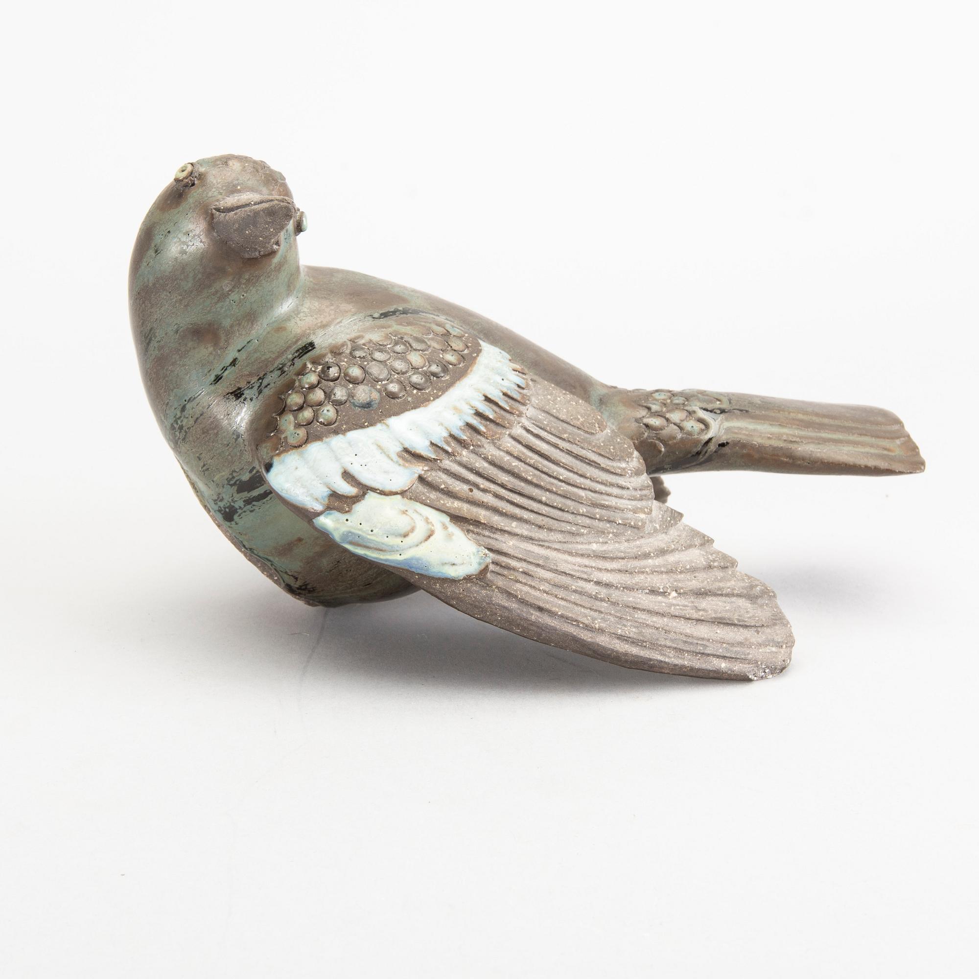 TYRA LUNDGREN, a stoneware sculpture of a bird.