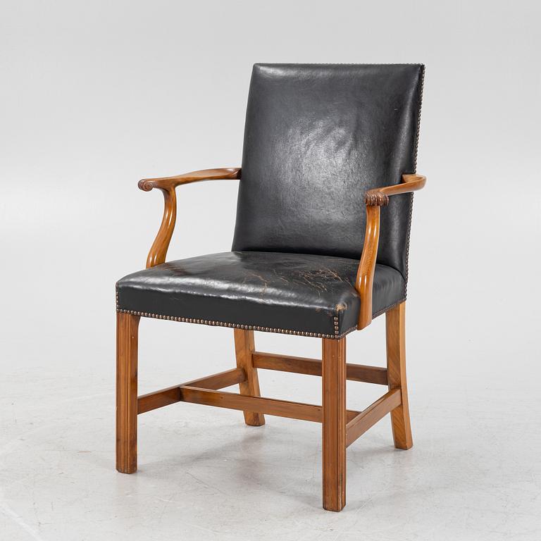 A leather upholstered armchair, 20th Century.