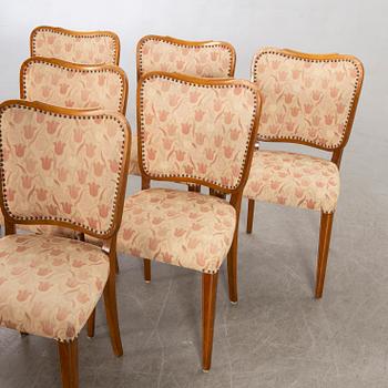 A 1950/60's dining table and chairs.