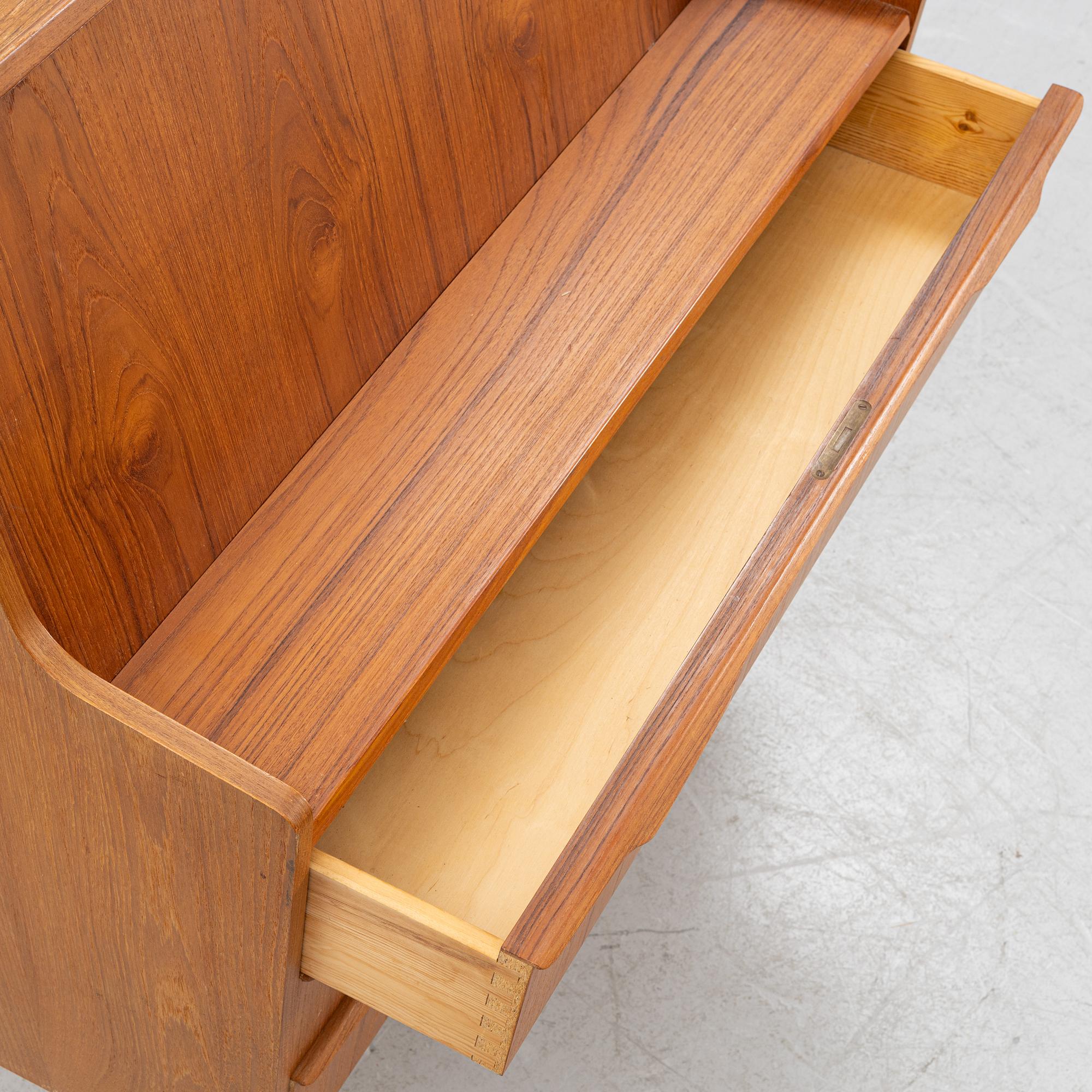 A teak writing desk, 1950-60s.