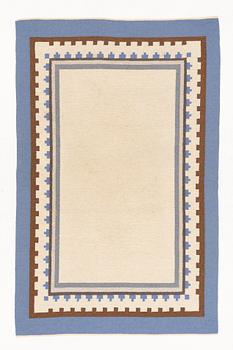 A Swedish flat weave rug, c. 304 x 197 cm.