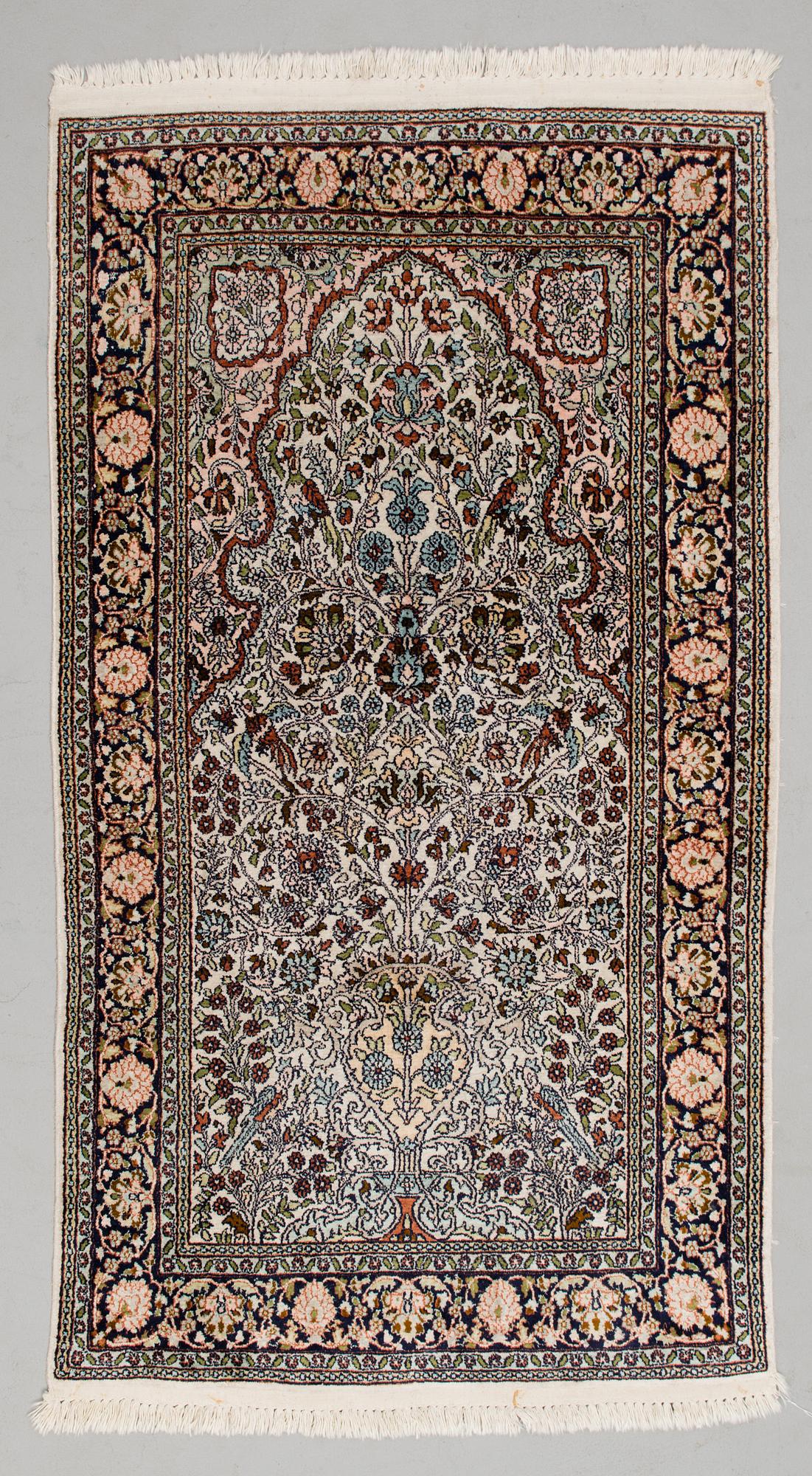 A CARPET, Kashmir, silk on cotton warp, 90x160 cm.