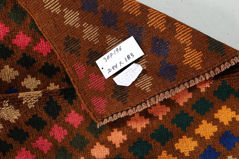 A rug, Afghan, ca 244 x 183 cm.
