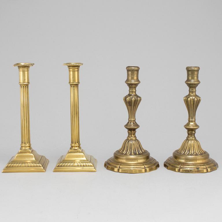 CANDLESTICKS, two pairs, brass, 18th and 19th century.