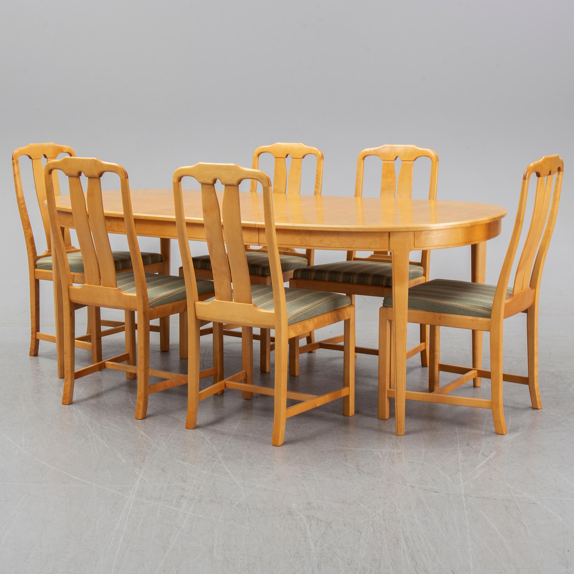 Carl Malmsten, a set of six 'Ambassadör' chairs and a 'Herrgården' dining table, second half of the 20th Century.