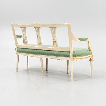 A painted and carved Gustavian style sofa, 1920's.