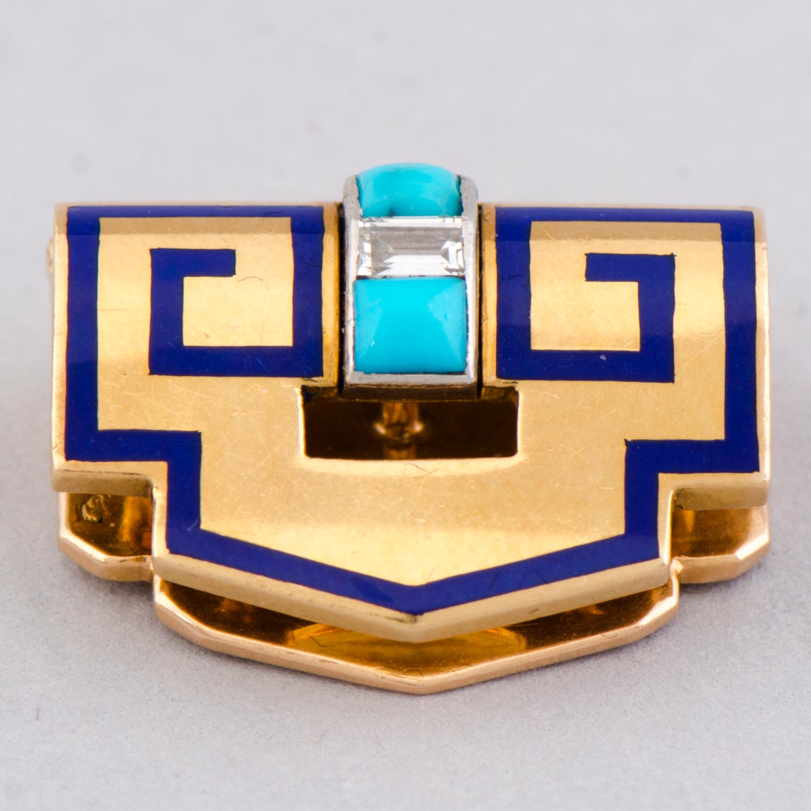 A CARTIER DRESS CLIP, baguette cut diamond, turqouise, 18k gold.