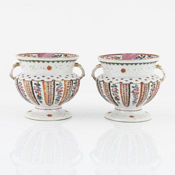 A pair of famille rose flower pots, Qing dynasty, Qianlong (1736-95).