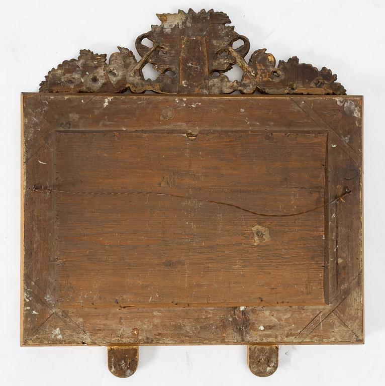 A pair of Late Empire gilded mirror sconces for two candles, Gothenburg, 1830s-40s.