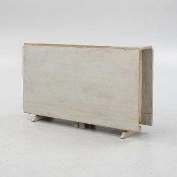 A painted gate-leg table, 19th Century.