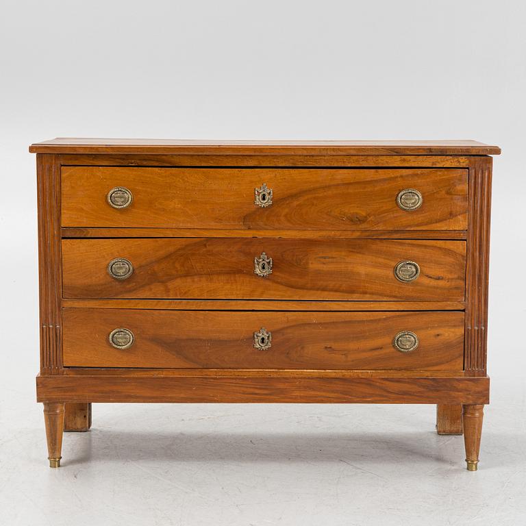 A Walnut veneered chest of drawers, late 19th Century.