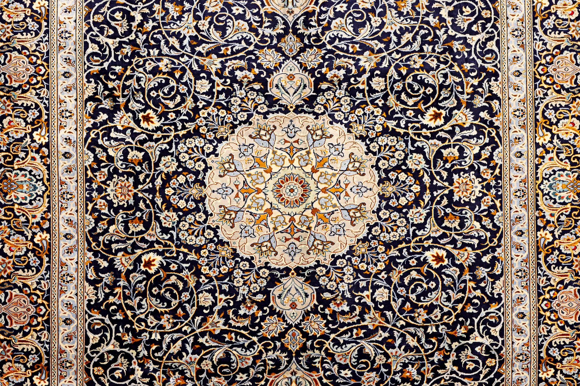 A Kashan carpet, c. 383 x 310 cm.