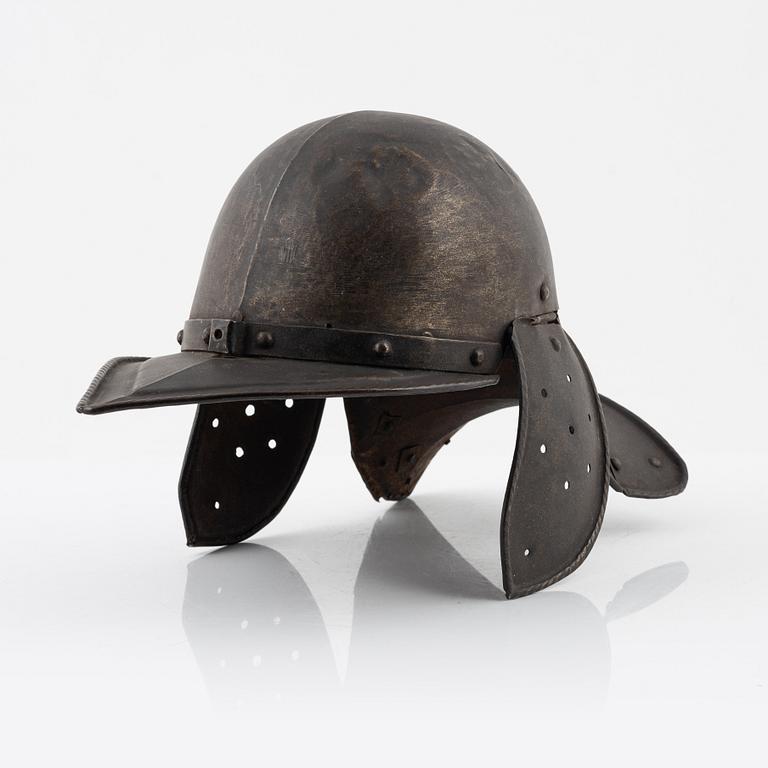 A 20th Century copy of a Lobstertail helmet.