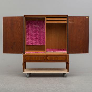 a mid 20th century mahogany cabinet.