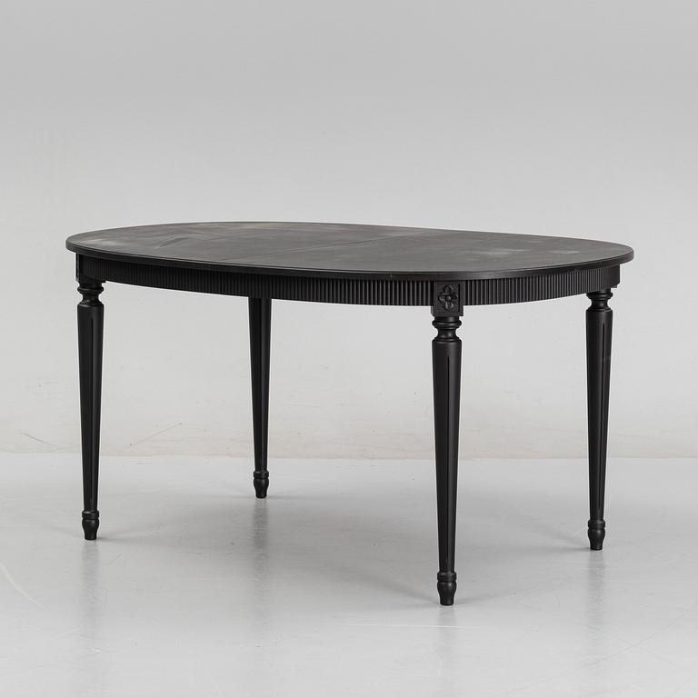 A Gustavians style dining table, second half of the 20th Century.