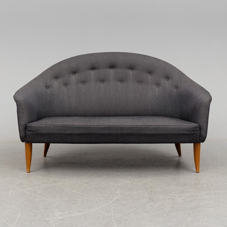 a 'Paradiset' sofa by KERSTIN HÖRLIN-HOLMQUIST for NK in the middle of the 20th century.