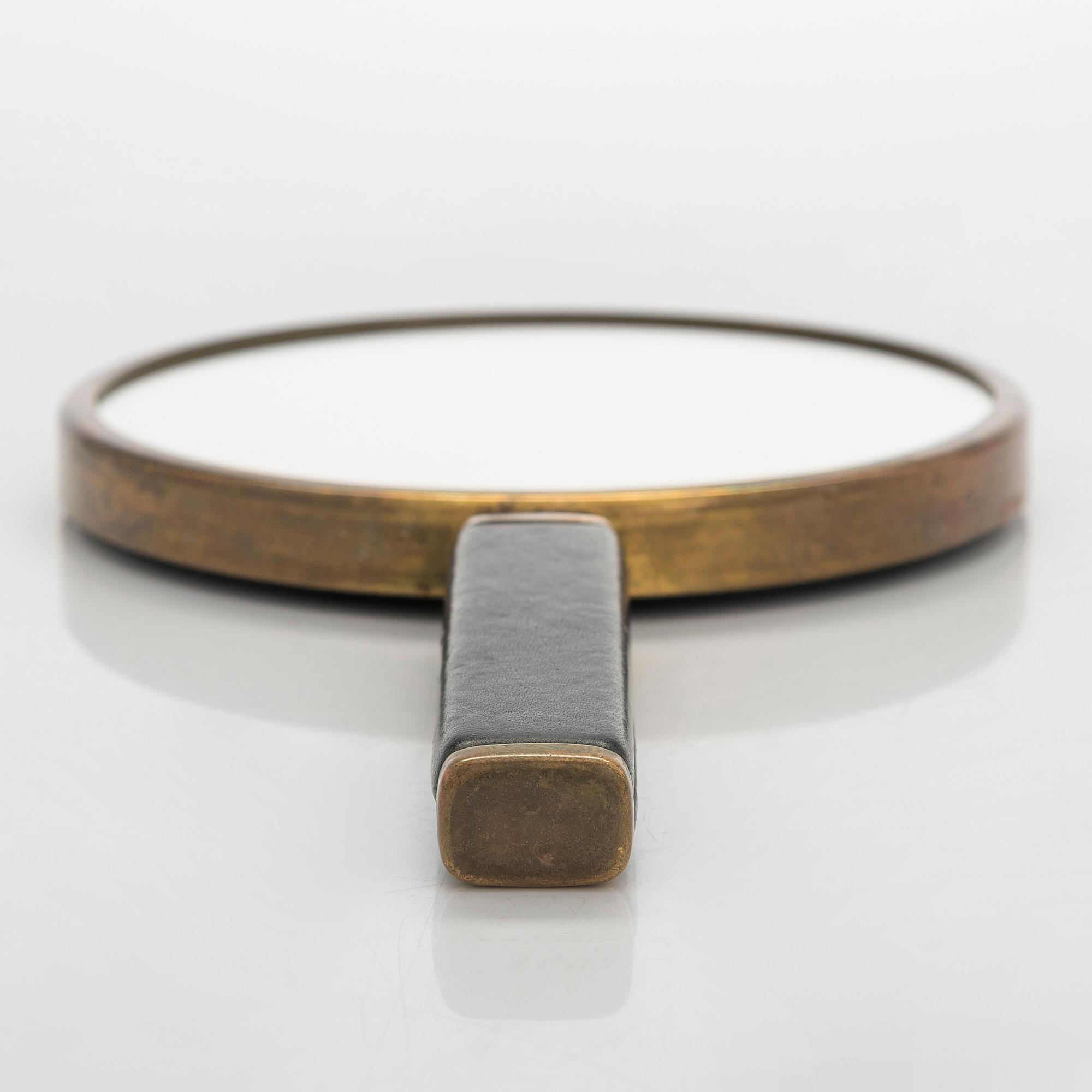 Maija Heikinheimo, A 1960s hand mirror for Valaistustyö, Finland.