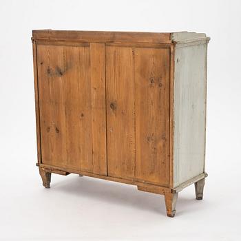 A late Gustavian grey lacquered pine cabinet, Sweden ca 1800.