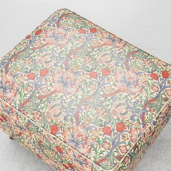 A "Djursholm" armchair with ottoman, Sweden, early 21st century.