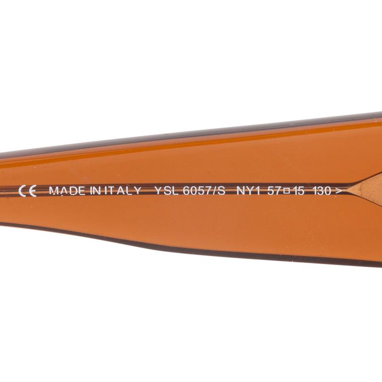 YVES SAINT LAURENT, a pair of sunglasses.