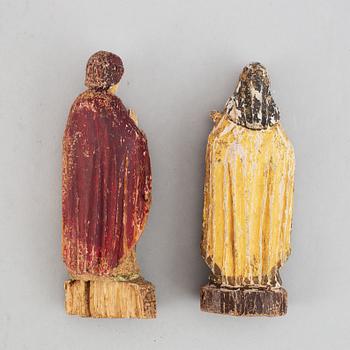 A pair of wooden figures around 1800.