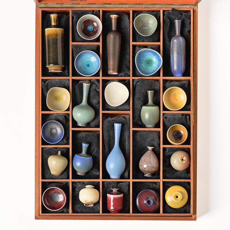 Berndt Friberg, a mahogany casket with stoneware miniatures, Gustavsberg Studio, no. 17.