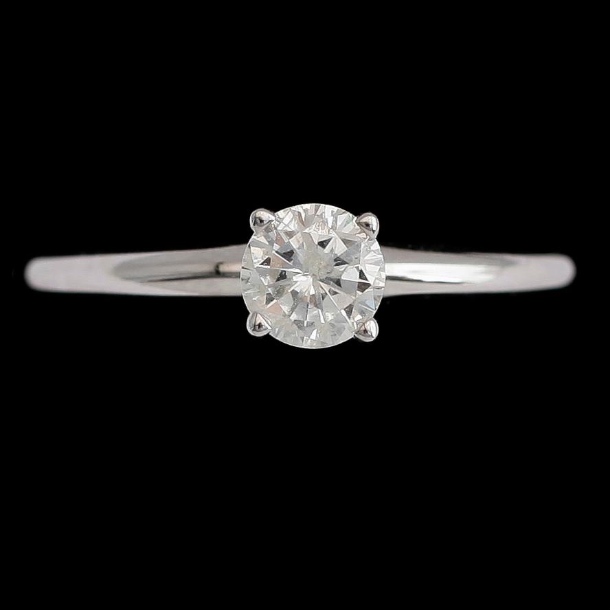 RING, 14 k vitguld, solitär briljantslipade diamant ca 0.50 ct.