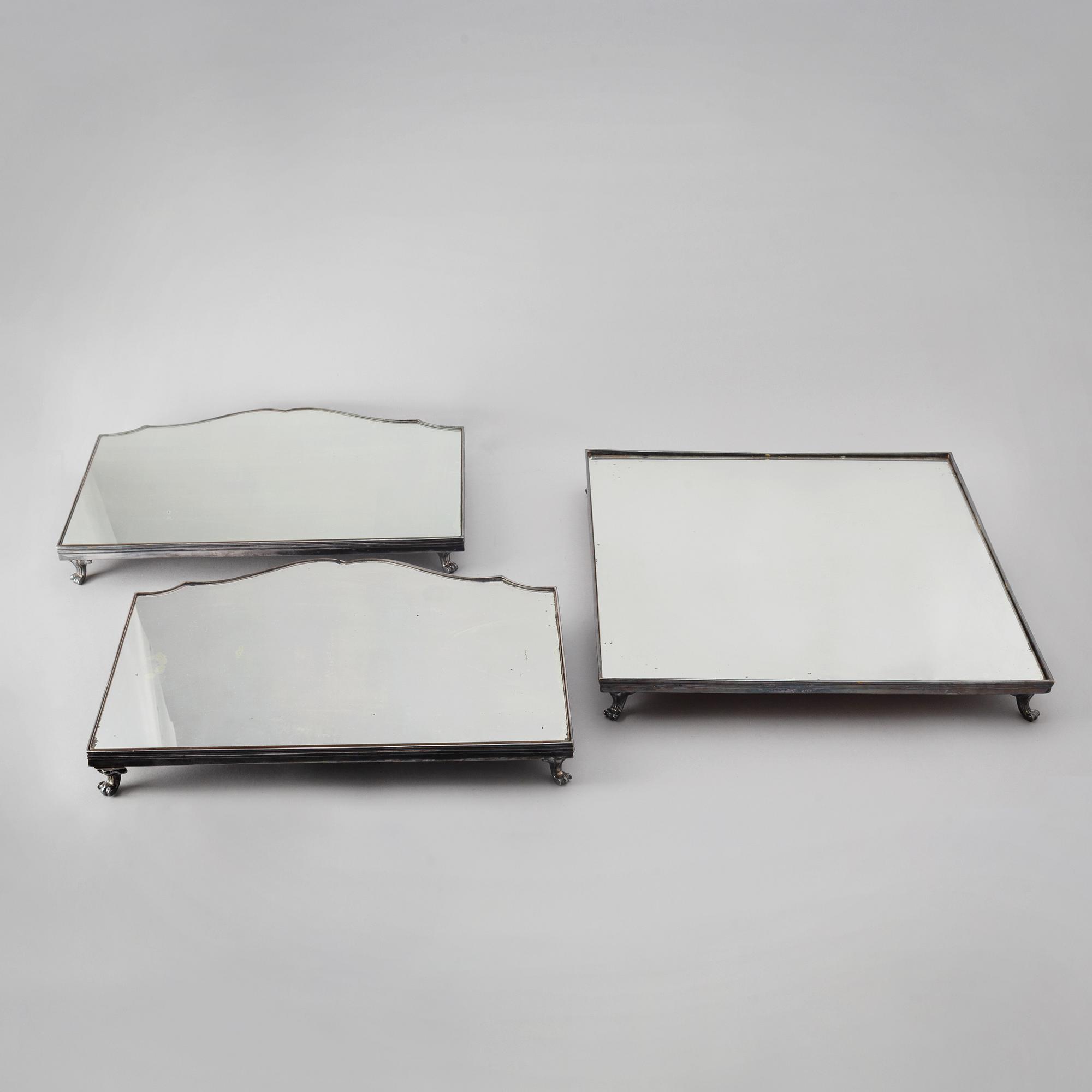 A 20th century silver plated mirror plateau.