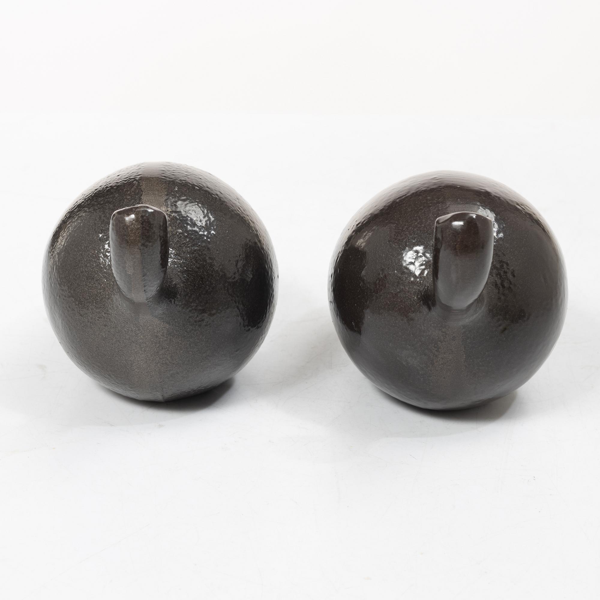 Eva Schildt and Maja Sten, doorstops, a pair, “Ekollon”, Firma Svenskt Tenn.