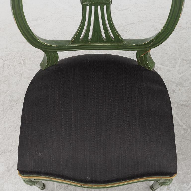 A Gustavian dining table with 8 chairs, Åmells, second half of the 20th century.