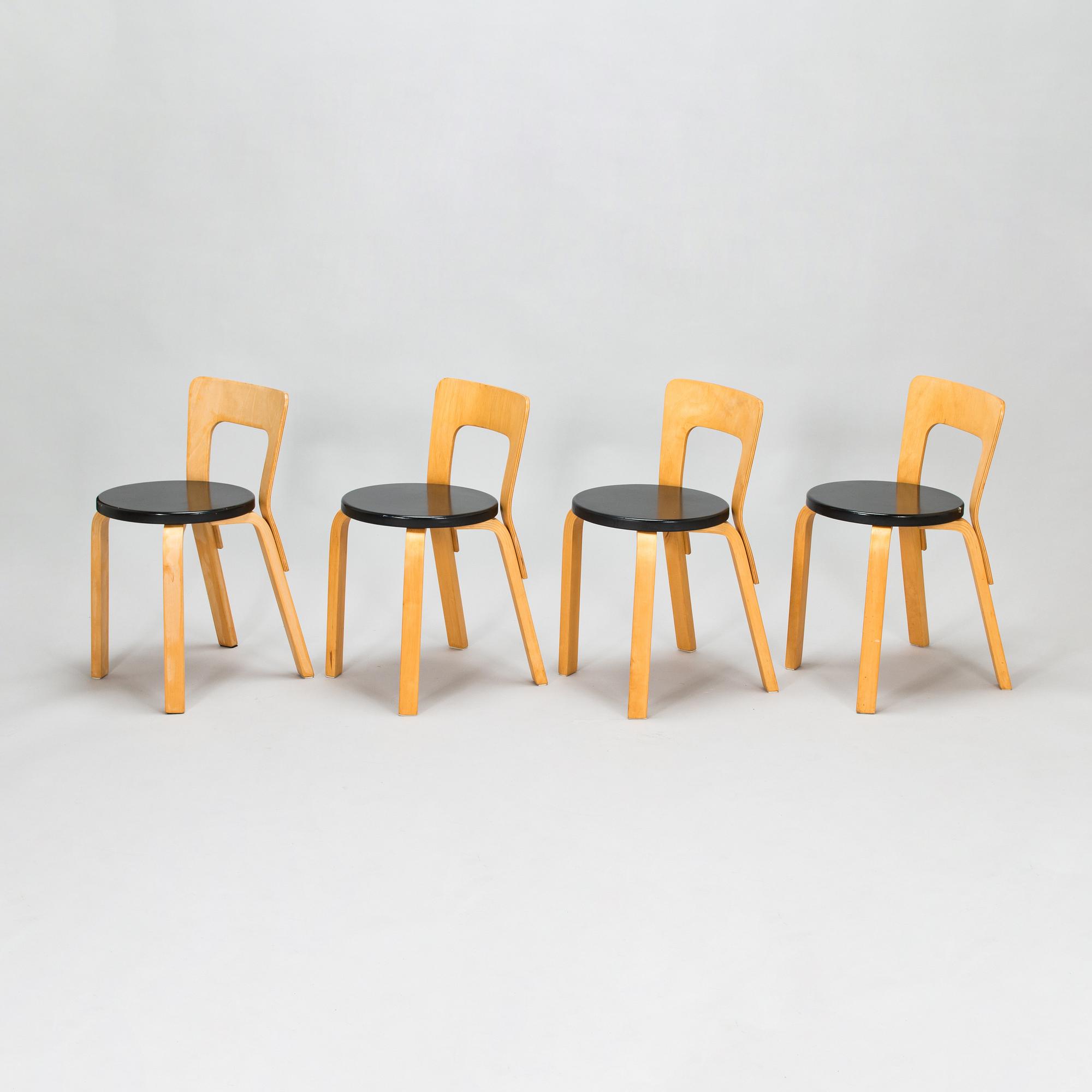 Alvar Aalto, four 1950s chairs, model 65, Artek.