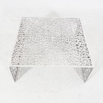 A 21st century aluminium coffee table.