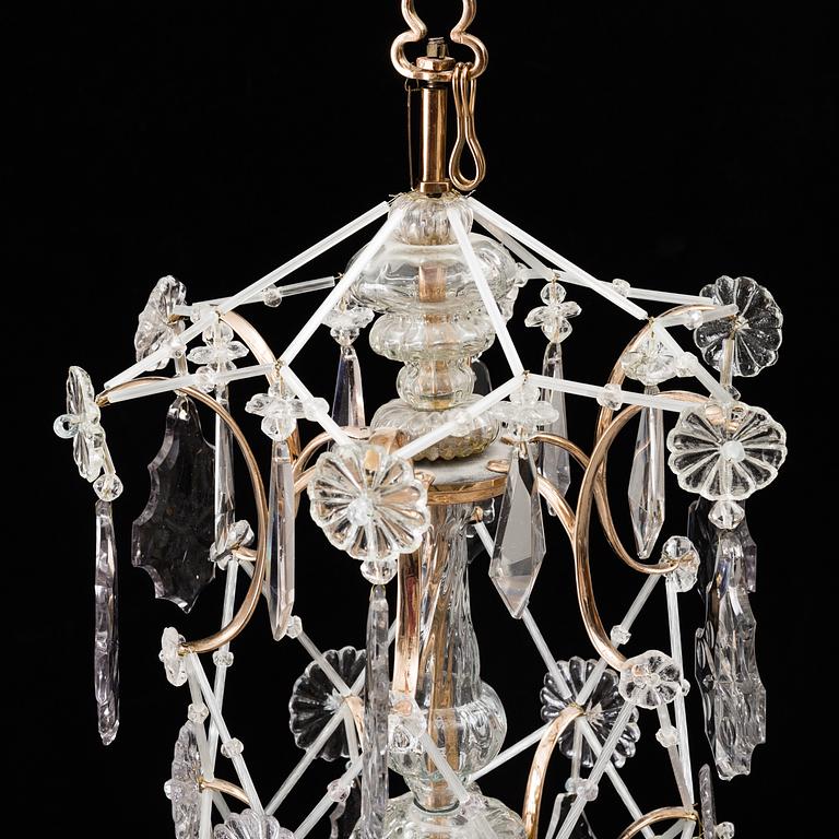 A 18th-20th century rococo and rococo style chandelier.