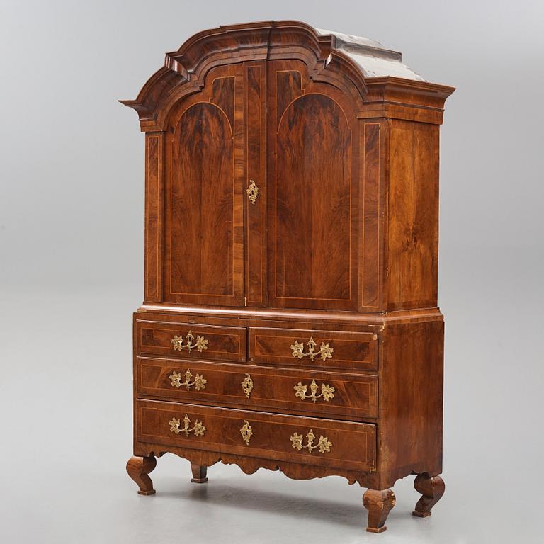 A rococo walnut parquetry cabinet, Stockholm, later part of the 18th century.