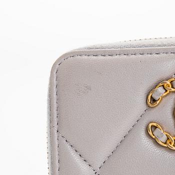 Chanel, A "19 O-coin purse" wallet.