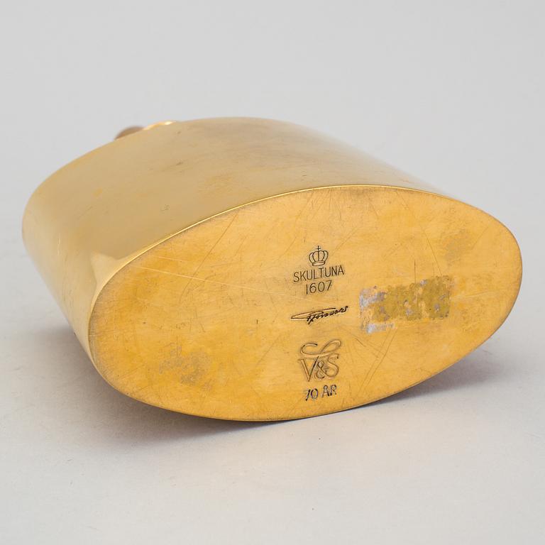 A Pierre Forssell brass decanter from Skultuna, Sweden.