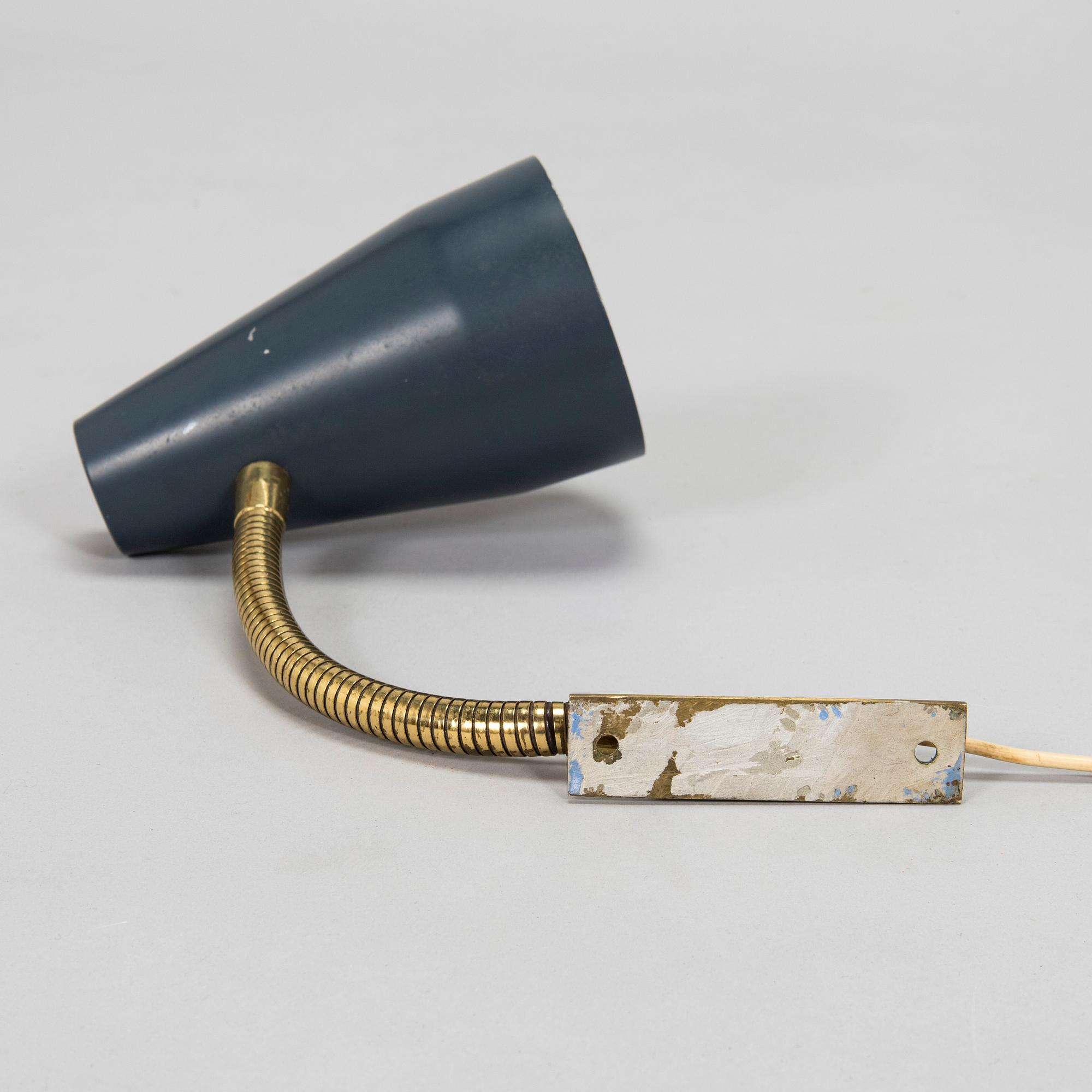 Lisa Johansson-Pape, a 1960's model '50-056' wall light for Stockmann Orno.