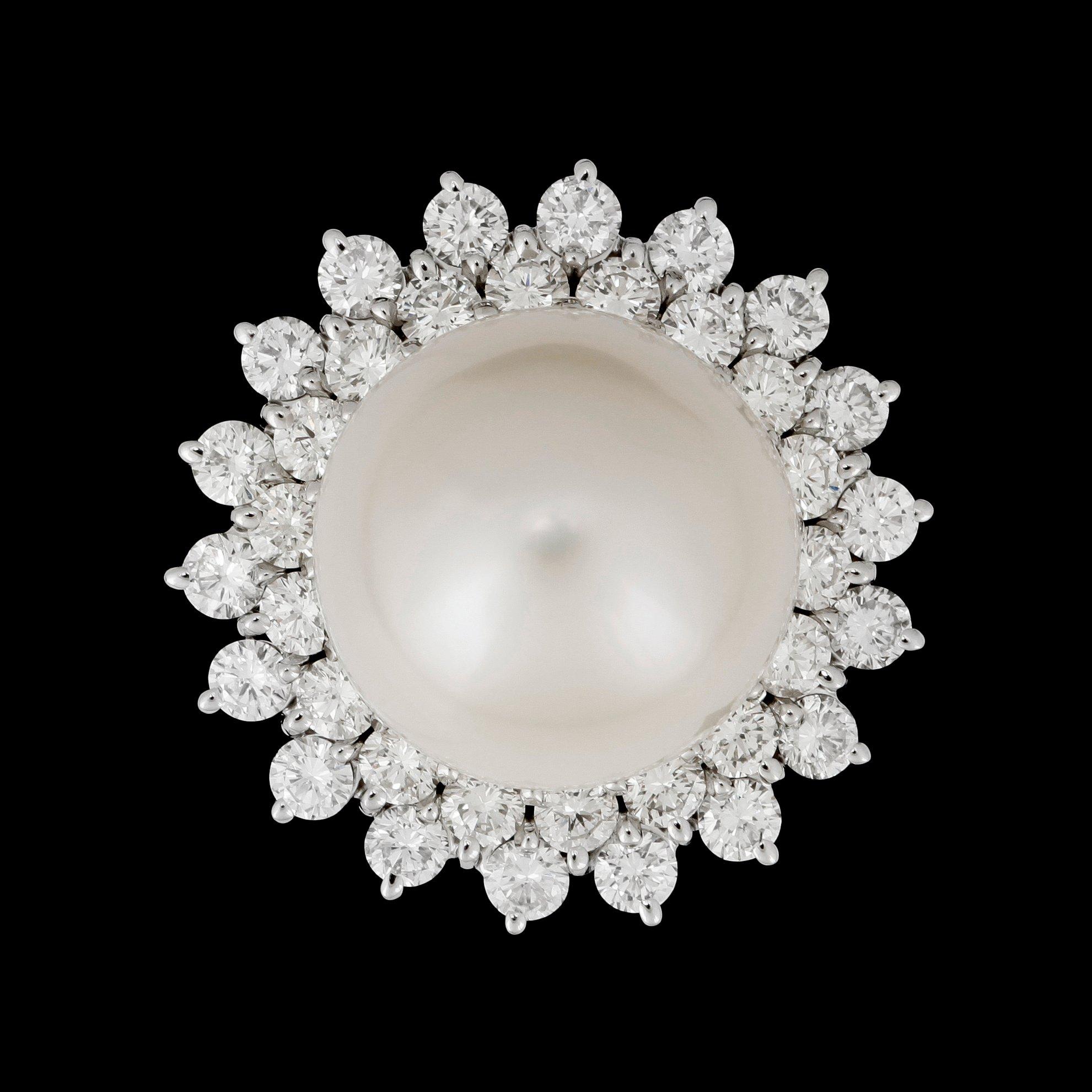 A cultivated South Sea pearl, circa 14.5 mm, and diamond, total gem weight circa 3.06 cts. Quality circa H/VS-SI.