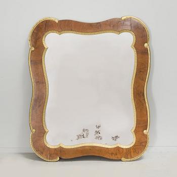 A mirror, around the year 1900.