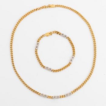 18K gold and small eight cut diamond necklace and bracelet.