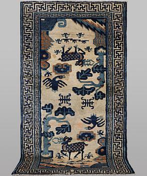 A rug, antique China, ca 125 x 60 cm.