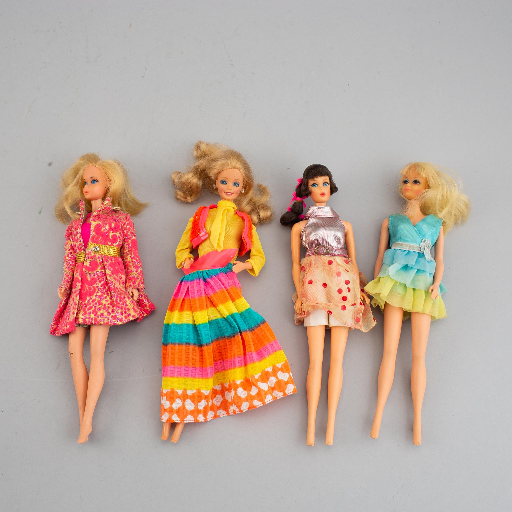 Four Barbiedolls with accessories, Mattel, 1960's-70's.
