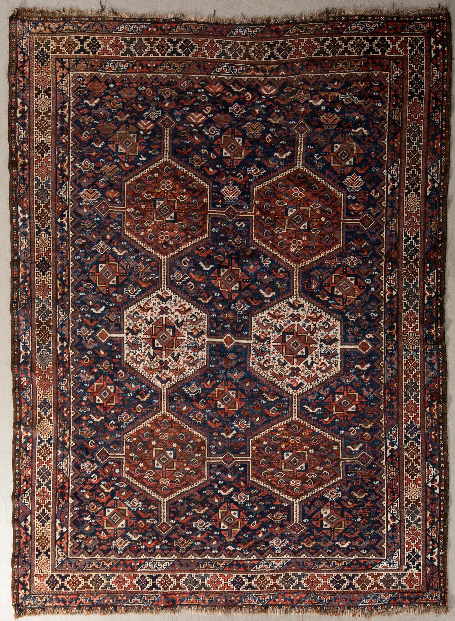 Antique Kamseh carpet, approximately 275x210 cm.