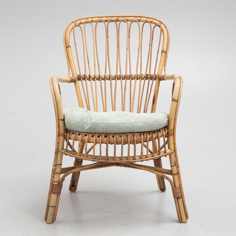 A wicker chair, mid 20th century.