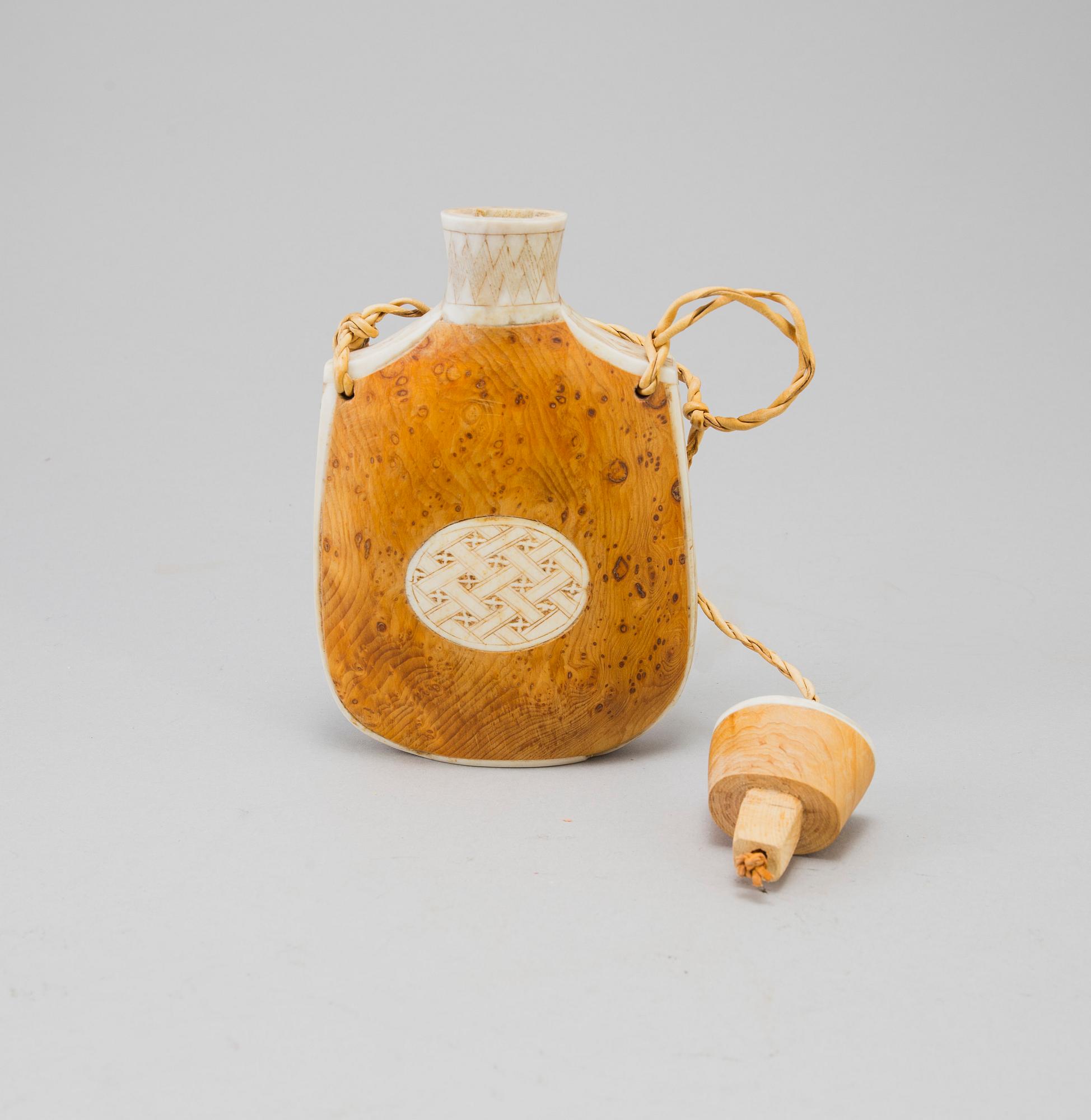 A Sami knife and bottle, Knut Dahlgren, Arvidsjaur, signed KD, second half of the 20th Century.